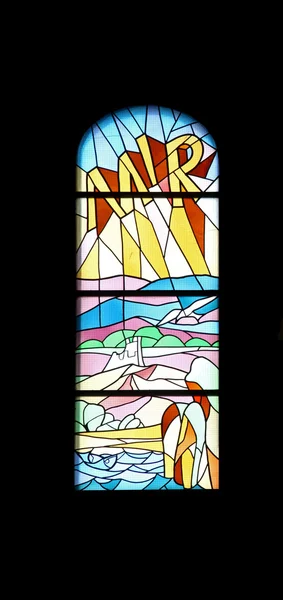 Peace, stained glass church window in the parish church of St. James in Medugorje