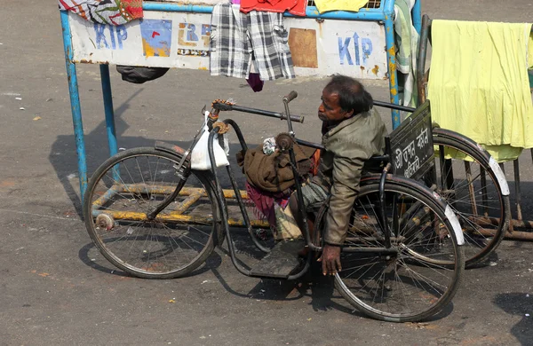 KOLKATA, INDIA - FEBRUARY, 10, 2014: Beggars in front of Nirmal, Hriday, Home for the Sick and Dying Destitutes in Kolkata