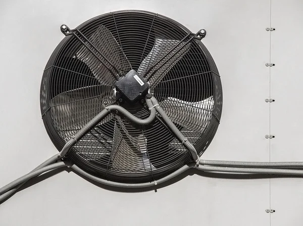Air conditioning fan,Outdoor Unit of Air Conditioner with pipes and shadow