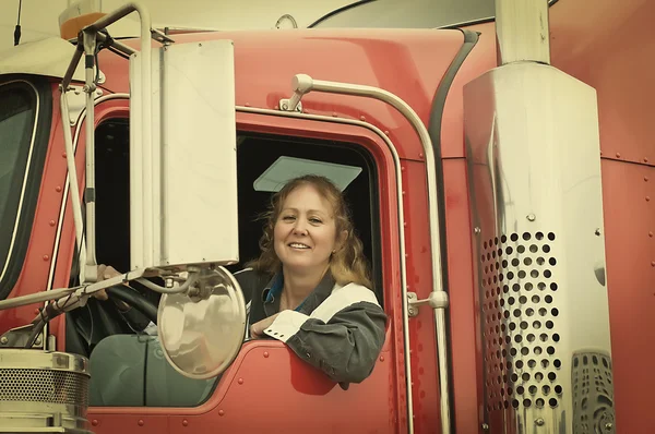 Woman Driving An Eighteen Wheeler