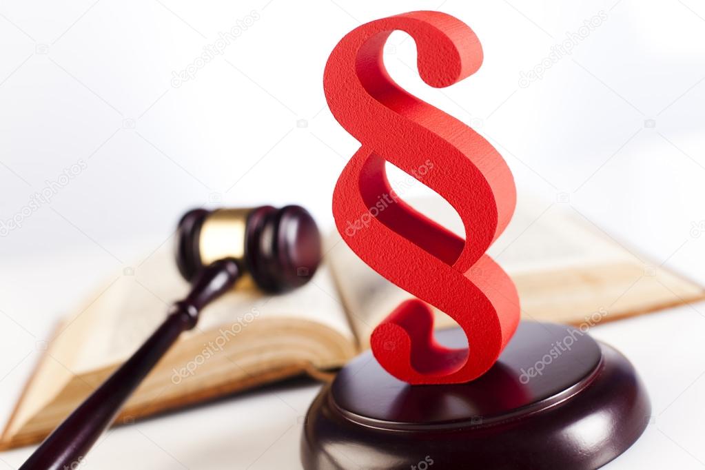 Absatz-Zeichen und rechts-Buch — Stockfoto © JanPietruszka #52093269