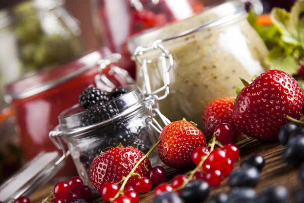 Homemade fruit jam in the glass jars