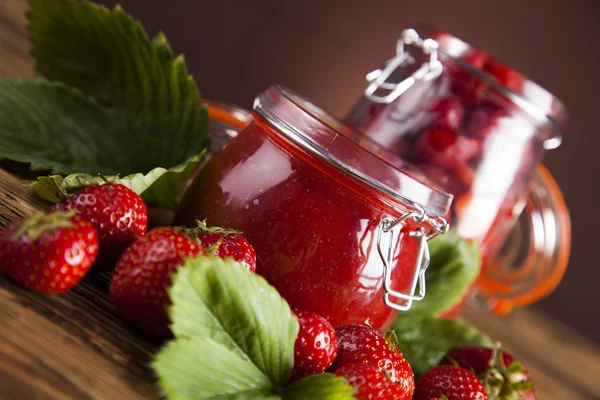 Homemade fruit jam in the glass jars