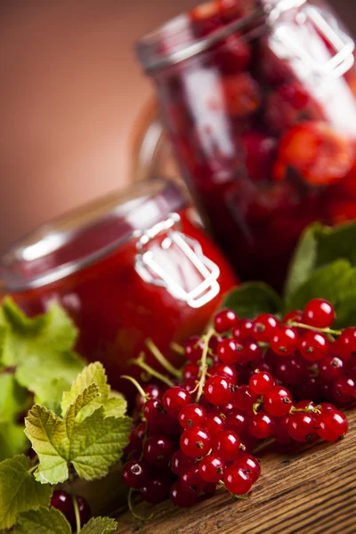 Homemade fruit jam in the glass jars