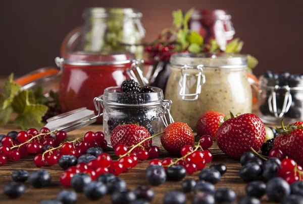 Homemade fruit jam in the glass jars