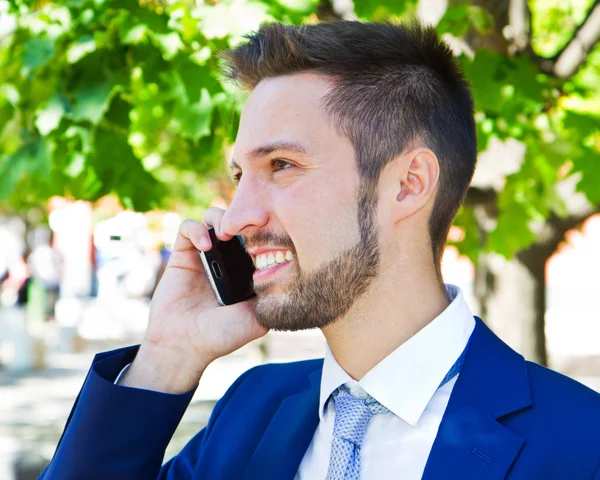 Business man speaking on the phone