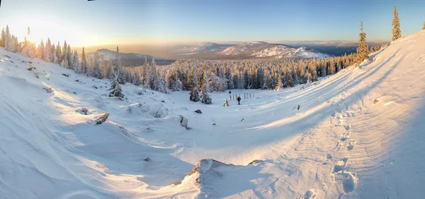 Morning panorama of Ural mountains in Russia, national park at dawn in winter