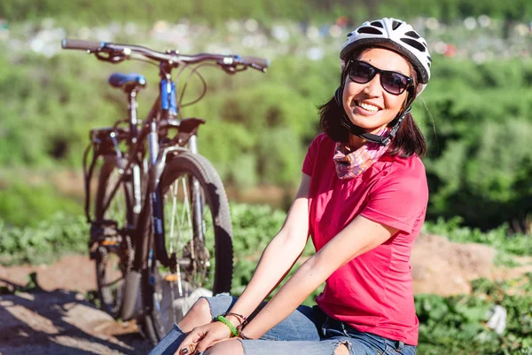 Cyclist Woman Showing Thumb Up gesture, Outdoor