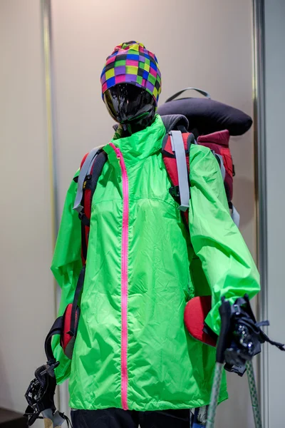 One male mannequin with mountaineering equipment. Hiking clothes