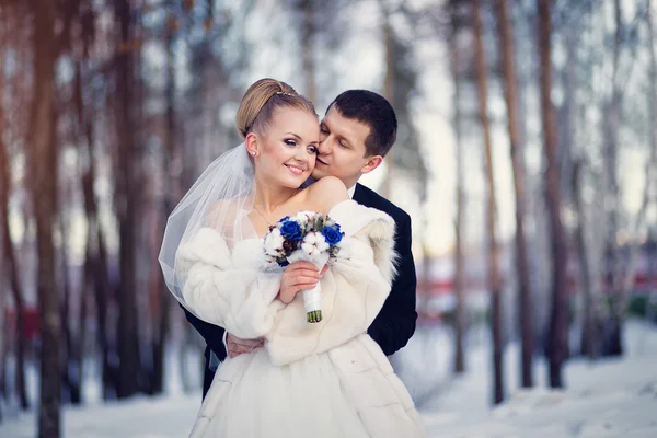 European wedding couple in winter park