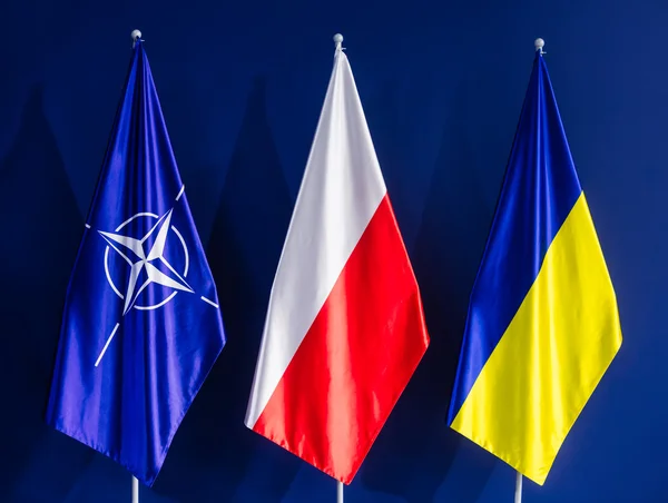 Flags of NATO, Poland and Ukraine at the NATO summit