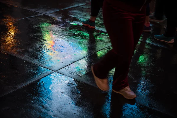 NYC streets after rain with reflections on wet asphalt