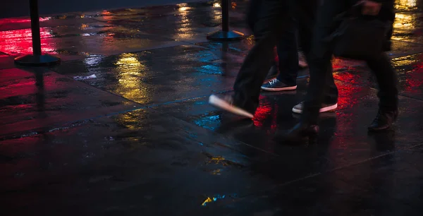 NYC streets after rain with reflections on wet asphalt