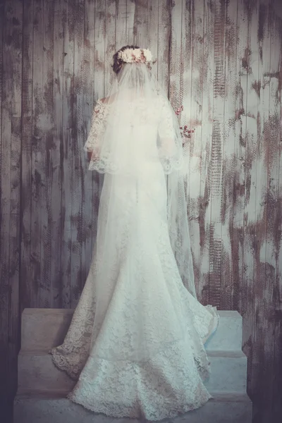 Beautiful wedding and a long white dress, veil, classic look.