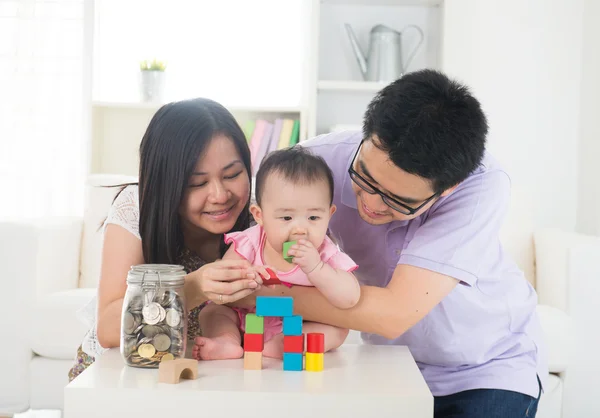 Asian family money saving