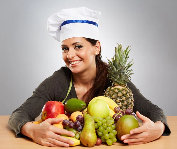 Woman cook with   fruits