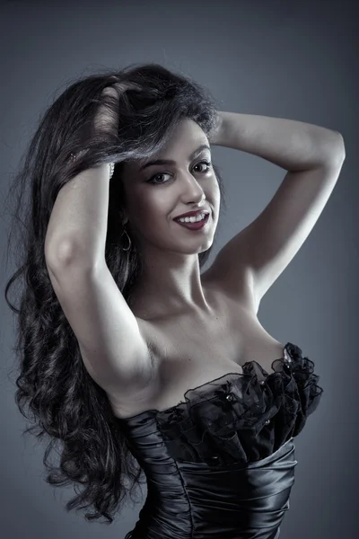 Hispanic female model smiling