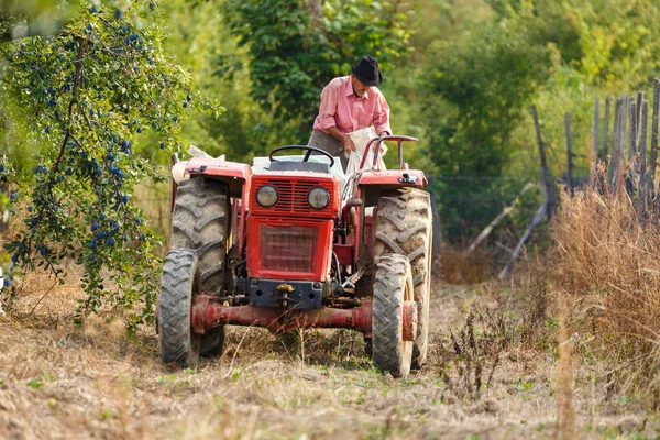 farmer on  tractor with  trailer