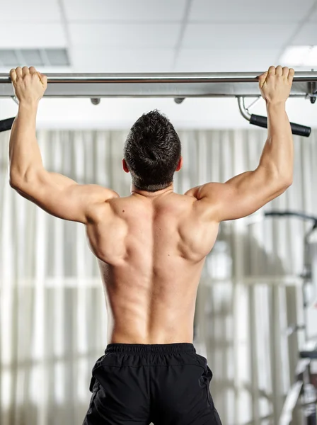 Man doing pull-ups