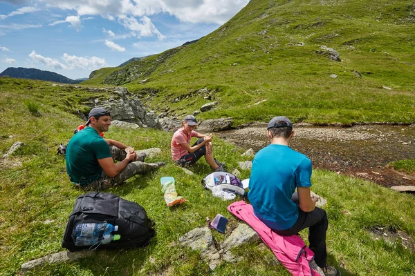 Hikers resting  in the mountains