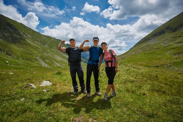 Hikers on a trail in the mountains