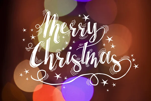 Merry christmas calligraphy bokeh background card