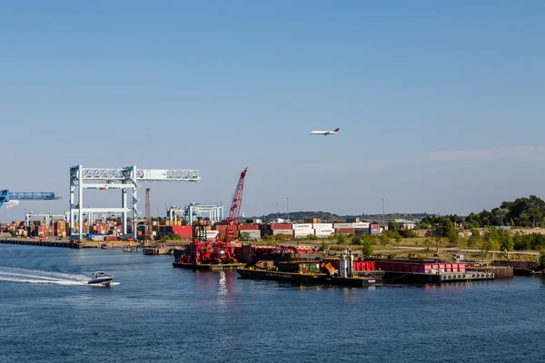 Shipping Port with Boat and Airplane