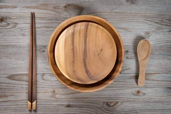 Empty plate, spoon and chopsticks