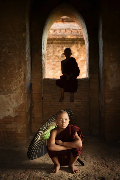 Buddhist novice monks inside temple