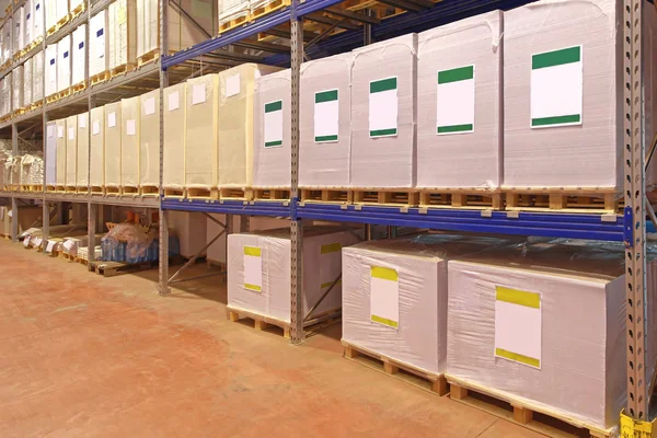 Pallets With Printing Paper in Warehouse