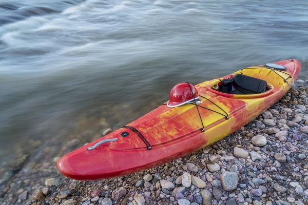 Whitewater kayak with helmet