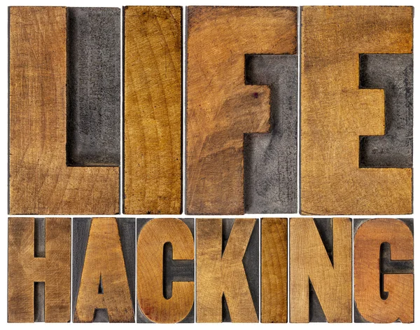 Life hacking word abstract in wood type