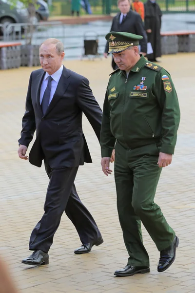 The President of Russia Vladimir Putin and Minister of Defense Sergey Shoygu