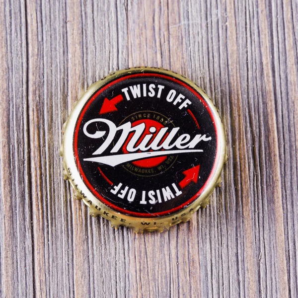 Miller cap over wood