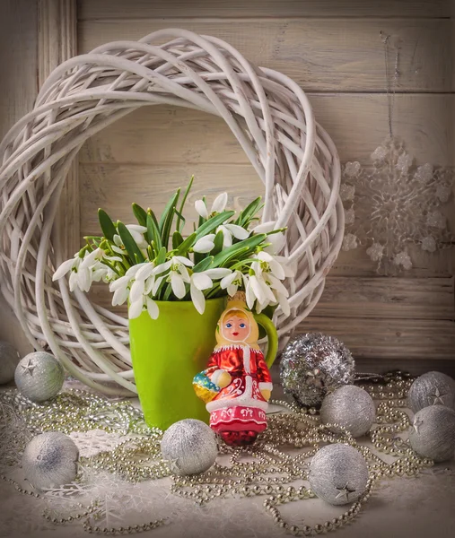 Bouquet of snowdrops and tree toy