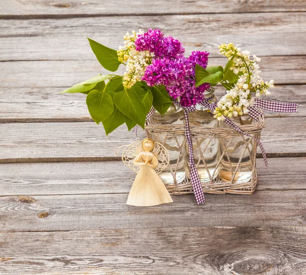 Lilac Bouquet and angel figurine