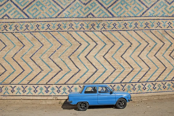 Retro soviet car near Bibi-Khanym mosque wall