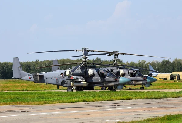 Two russian combat helicopters at the air base