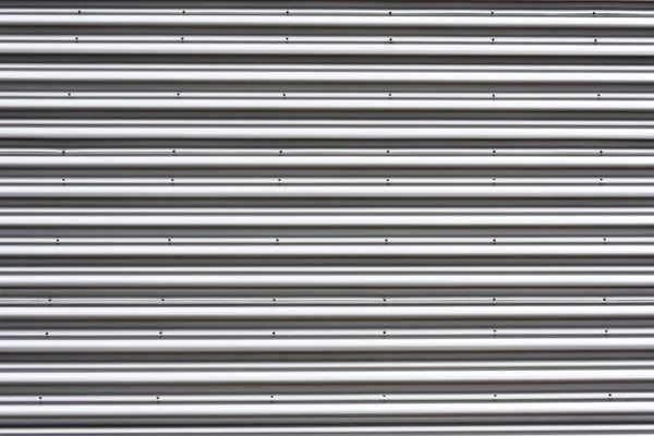 Striped texture of corrugated metal.