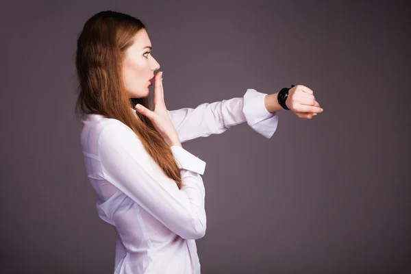 Woman looking at watch