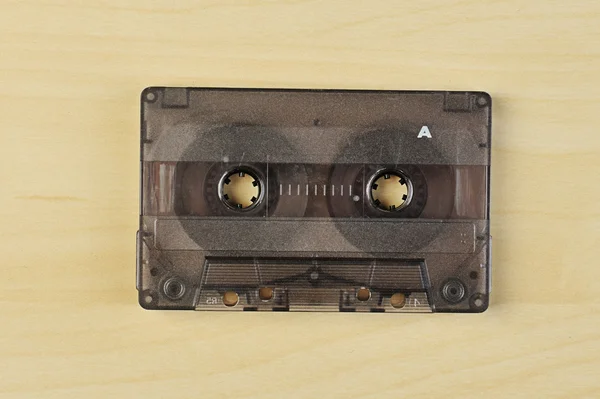 Audio cassette on wood table