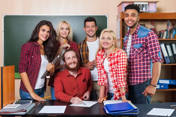 Students With Professor in University Classroom