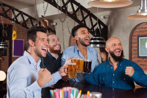Man Group In Bar Screaming And Watching Football, Drinking Beer Hold Mugs, Mix Race Cheerful Friends