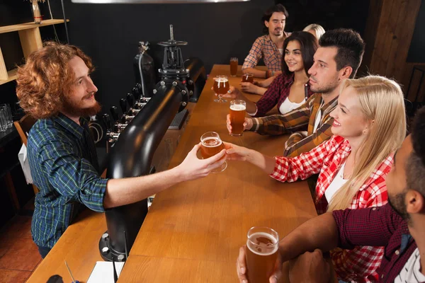 Young People Group In Bar, Barman Give Beer, Friends Sitting At Wooden Counter Pub Top View,  Communication