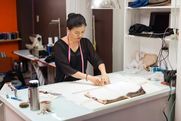 Asian female tailor