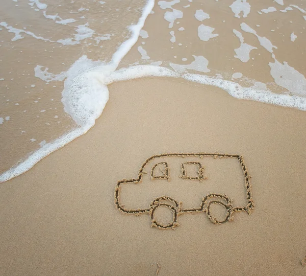 Bus drawing in the sand