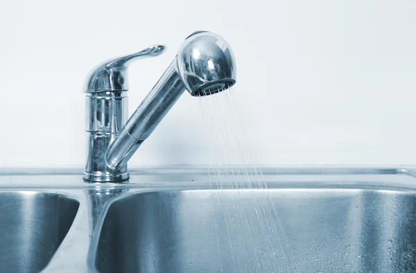 Kitchen Water tap and sink.