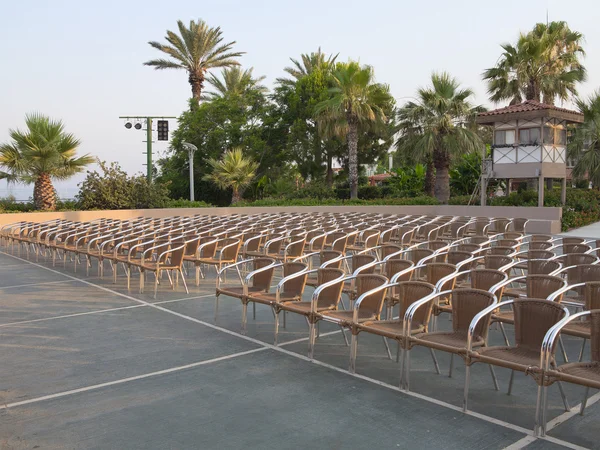 Row of chair seats in open air theater