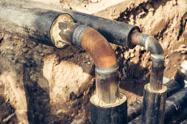 Maintenance of industrial pipes for heating water transport