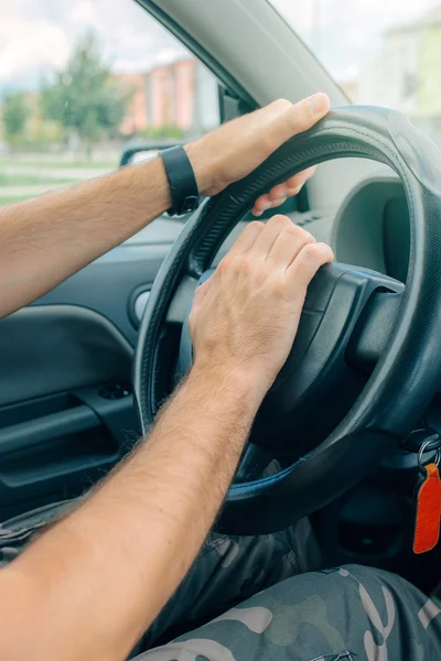 Nervous male driver pushing car horn in traffic rush hour